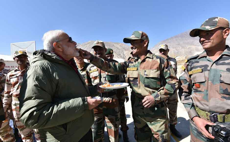 Amid tension on the border with Pakistan, PM Modi saluted the valour of the armed forces and lauded their sacrifice while dedicating the festival of Diwali to them. (Photo: Twitter @narendramodi) Amid tension on the border with Pakistan, PM Modi saluted the valour of the armed forces and lauded their sacrifice while dedicating the festival of Diwali to them. (Photo: Twitter @narendramodi)