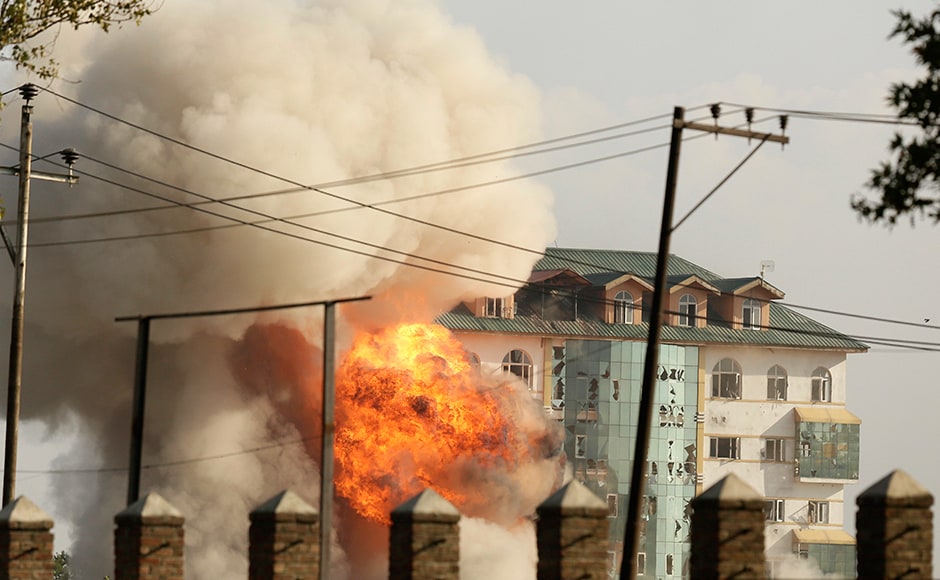 Two or three militants opened fire at security forces while they were dousing the fire which had engulfed the upper floor of the seven storey hostel building of EDI. Photo: AP Two or three militants opened fire at security forces while they were dousing the fire which had engulfed the upper floor of the seven storey hostel building of EDI. Photo: AP