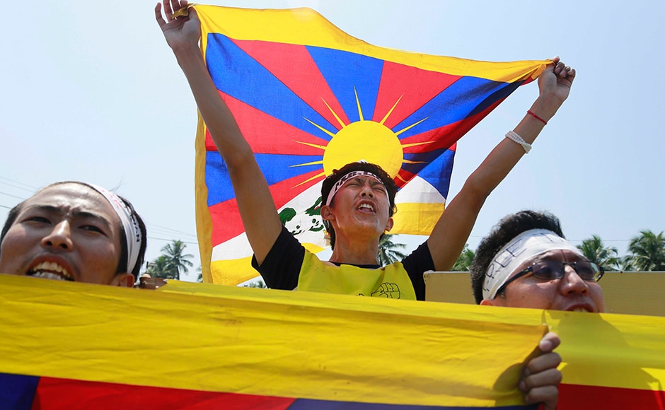 Cops had detained a few Tibetans who were shouting slogans against the visit of Chinese President Xi Jinping for China's illegal possession of Tibet. (Photo: AP) Cops had detained a few Tibetans who were shouting slogans against the visit of Chinese President Xi Jinping for China's illegal possession of Tibet. (Photo: AP)