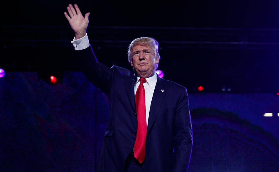 Donald Trump waves at visitors after speaking to the Republican Hindu Coalition on Saturday. AP Donald Trump waves at visitors after speaking to the Republican Hindu Coalition on Saturday. AP