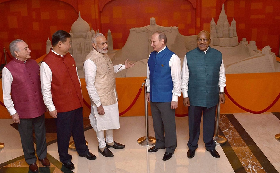 Prime Minister Narendra Modi with Brics leaders Michel Temer, President of Brazil, Jacob Zuma, President of South Africa, Russian President Vladimir Putin, Chinese President Xi Jinping wearing Khadi jackets in front of sand sculpture made by Sudarsan Pattnaik ahead of 17th India-Russia annual summit meet in Goa on Saturday. (Photo: PTI) Prime Minister Narendra Modi with Brics leaders Michel Temer, President of Brazil, Jacob Zuma, President of South Africa, Russian President Vladimir Putin, Chinese President Xi Jinping wearing Khadi jackets in front of sand sculpture made by Sudarsan Pattnaik ahead of 17th India-Russia annual summit meet in Goa on Saturday. (Photo: PTI)
