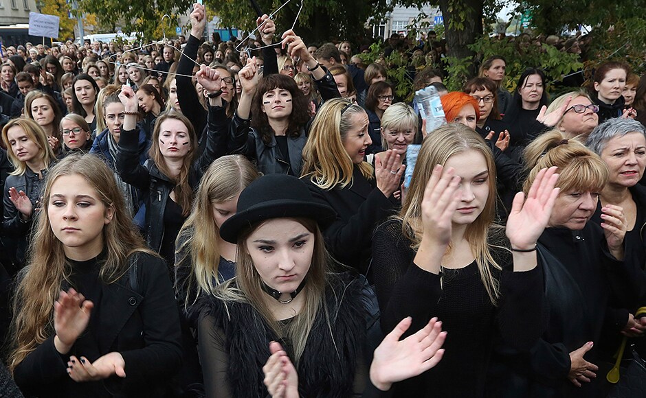 The strike and street demonstrations follow a street protest by thousands on Saturday in front of the parliament in Warsaw. Women wore black in a sign of mourning for the feared loss of reproductive rights and for the deaths that they feel some women would face. (Photo: AP) The strike and street demonstrations follow a street protest by thousands on Saturday in front of the parliament in Warsaw. Women wore black in a sign of mourning for the feared loss of reproductive rights and for the deaths that they feel some women would face. (Photo: AP)