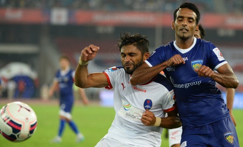 Delhi Dynamos FC Indian defender Anas Edathodika (L) and Chennaiyin FC Indian midfielder Harmanjot Khabra tussle for the ball during the ISL 2015 season. AFP