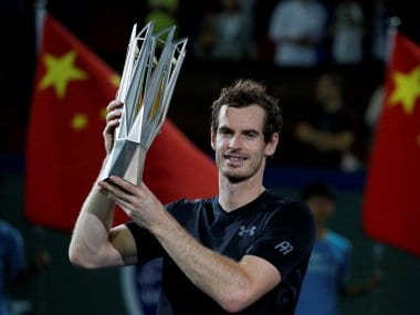 Andy Murray poses with the Shanghai Masters trophy after winning tournament. Reuters