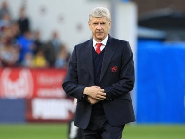 Arsene Wenger and celebrating his twenty years in charge of Arsenal. AFP