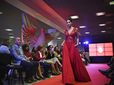 A model wears a creation by designer Micaela Oliveira during a presentation by Benfica. AFP