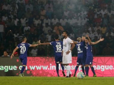 Chennaiyin FC players celebrate scoring a goal during their match against NEUFC. ISL