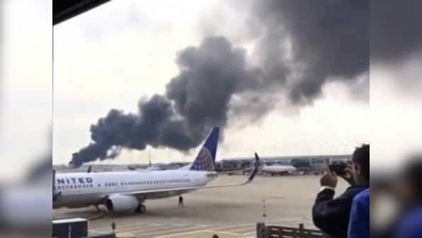 Miami bound American Airlines flight catches fire at Chicago's O'Hare airport before takeoff
