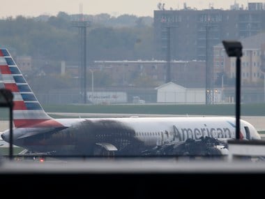 Soot covers the fuselage of an American Airlines jet that that caught fire at O'Hare International Airport in Chicago on 28 October. Reuters