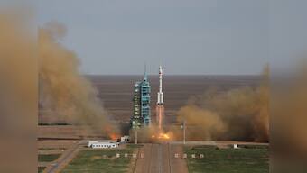China launches manned mission to experimental space station