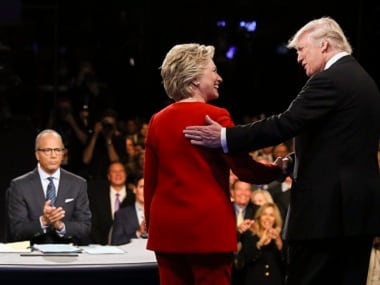 Democratic presidential nominee Hillary Clinton and Republican presidential nominee Donald Trump shake hands during the presidential debate at Hofstra University in Hempstead, N.Y., Monday, Sept. 26, 2016. (Joe Raedle/Pool via AP)