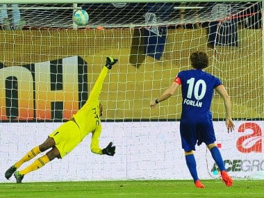 Diego Forlan of Mumbai City FC scores from the spot against NorthEast United FC. Sportzpics