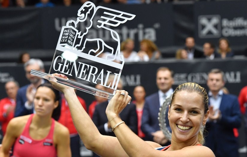 Dominika Cibulkova poses with her trophy after her final match against Viktorija Golubic. AP
