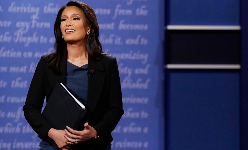 Moderator Elaine Quijano of CBS News addresses the audience before the debate. AP