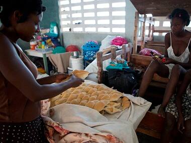 Haitians rebuild lives after Hurricane Matthew; food, water and supplies arrive