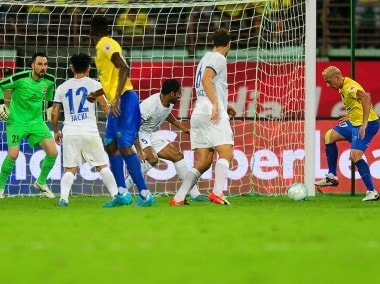 Michael Chopra of Kerala Blasters FC tackles the ball against Mumbai City FC. ISL