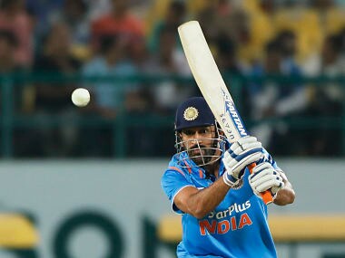 Indian cricket captain Mahendra Singh Dhoni bats during their first one-day international cricket match against New Zealand. AP