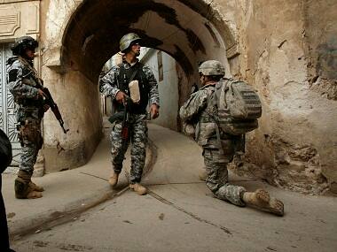 Islamic State snipers, suicide bombers slow advance of government troops in Mosul