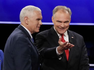 Mike Pence (left) with Tim Kaine. AP