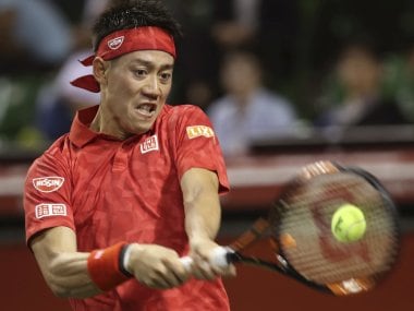 Kei Nishikori in action against Donald Young at the Japan Open. AP