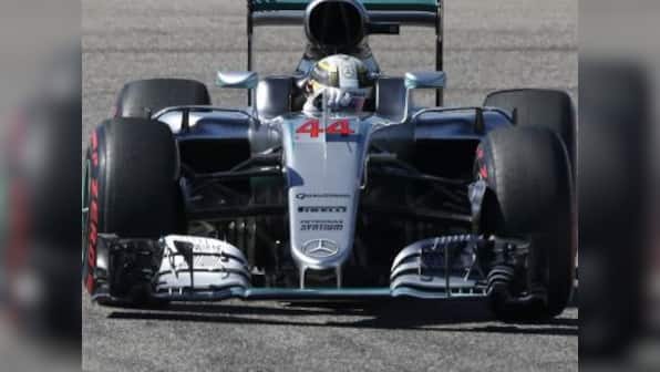 United States GP: Lewis Hamilton powers to pole with record lap ahead of Nico Rosberg
