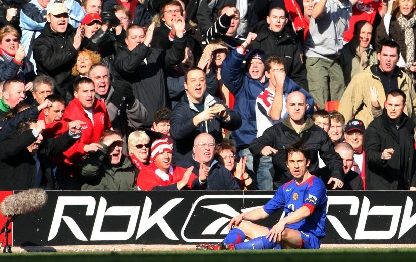 Liverpool supporters heckle Manchester United's Gary Neville during their FA Cup match at Anfield. Reuters