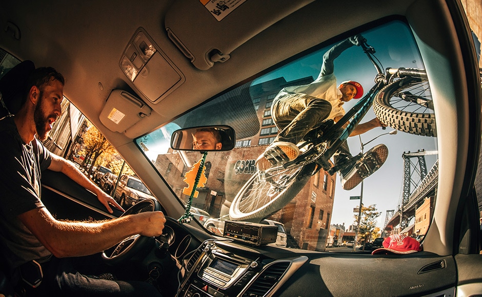 This dynamic image that won the New Creativity category was shot by Ale Di Lullo. The Italian photographer shot Professional Freeride Mountain Biker Aaron Chase riding his bike on the windshield of a NYC cab. Ale Di Lullo/ Redbull Illume This dynamic image that won the New Creativity category was shot by Ale Di Lullo. The Italian photographer shot Professional Freeride Mountain Biker Aaron Chase riding his bike on the windshield of a NYC cab. Ale Di Lullo/ Redbull Illume