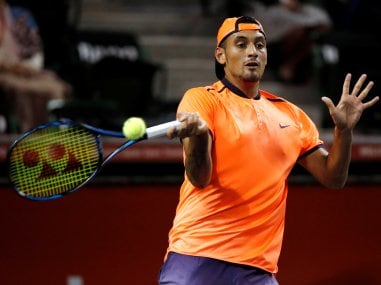 Nick Kyrgios returns the ball during the match against Gael Monfils. Reuters