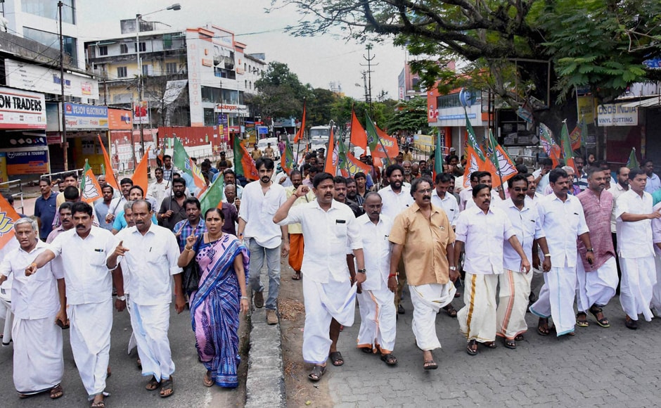 The protesters destroyed the advertisements of the CPI(M) and clashed with some persons who tried to venture out of their homes. Photo: PTI The protesters destroyed the advertisements of the CPI(M) and clashed with some persons who tried to venture out of their homes. Photo: PTI