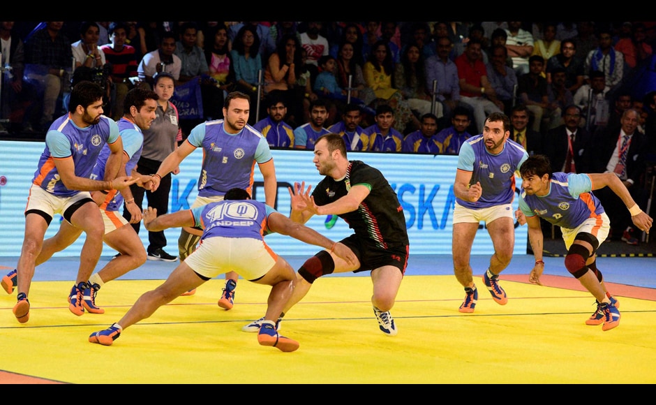 Indian players try to hold Iran off during the final match of the Kabaddi World Cup 2016. A superior defensive performance in the second half turned the table on the Iranians. PTI Indian players try to hold Iran off during the final match of the Kabaddi World Cup 2016. A superior defensive performance in the second half turned the table on the Iranians. PTI