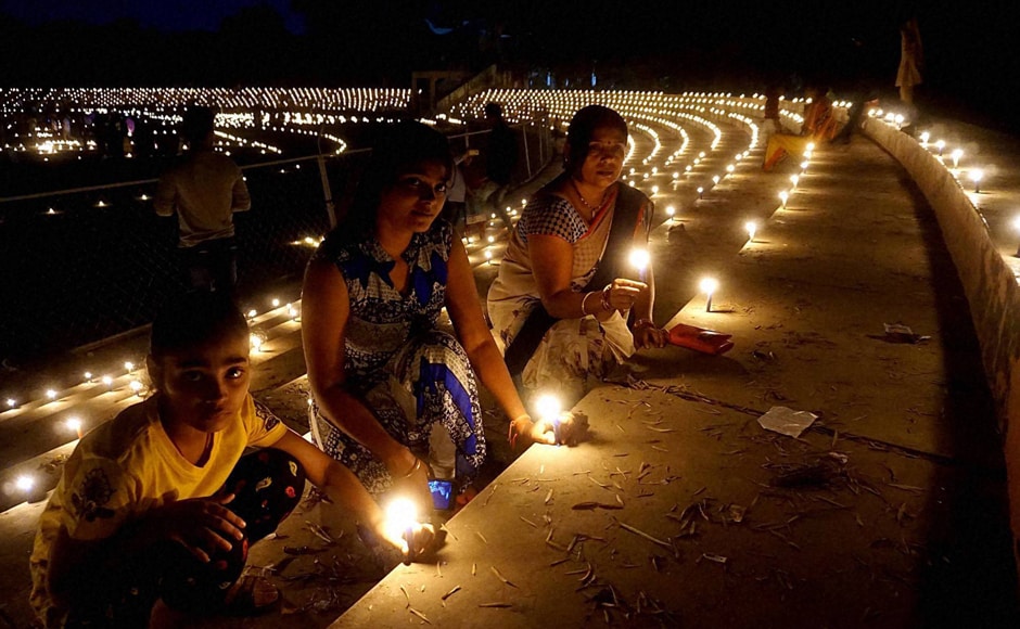 Sportspersons lighting candles to paying tribute to Indian soldiers “Ek Diya Shaheedon Ke Naam” on the eve of Diwali festival at a stadium in Varanasi on Saturday. (Photo: PTI) Sportspersons lighting candles to paying tribute to Indian soldiers “Ek Diya Shaheedon Ke Naam” on the eve of Diwali festival at a stadium in Varanasi on Saturday. (Photo: PTI)
