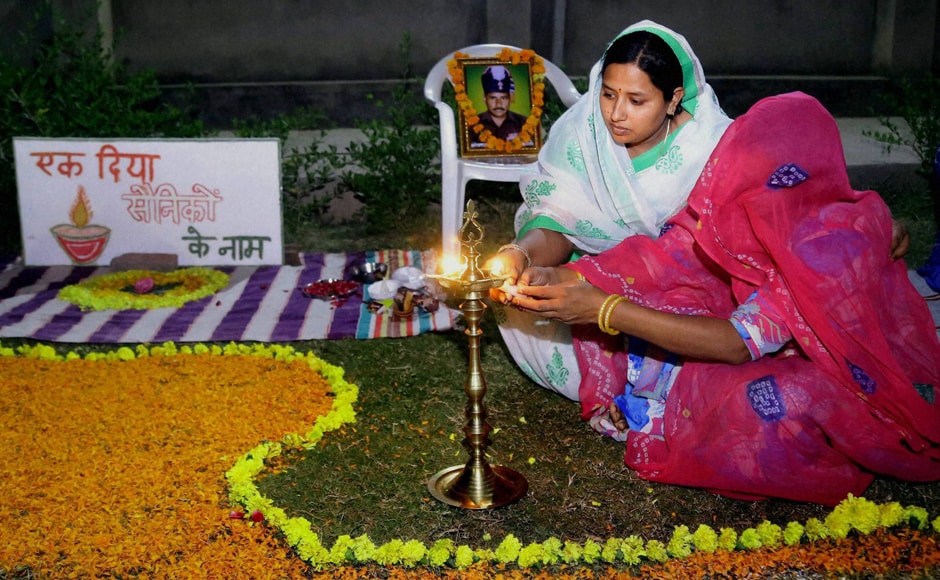 Uri attack soldier's Nimb Singh's family celebrating Diwali at Beawar on Saturday. (Photo: PTI) Uri attack soldier's Nimb Singh's family celebrating Diwali at Beawar on Saturday. (Photo: PTI)