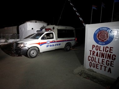 A police truck is seen at a gate to the Police Training Center after an attack on the center in Quetta, Pakistan on 25 October. Reuters