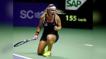 WTA Finals: Dominika Cibulkova sends Simona Halep packing, keeps her chances alive