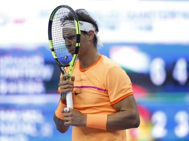 Rafael Nadal of Spain reacts after losing a point to Grigor Dimitrov at the China Open. AP