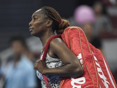 Venus Williams leaves the court after losing to Peng Shuai at China Open. AFP