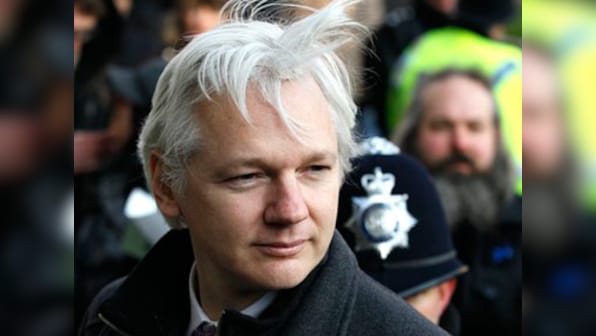 Julian Assange arrest: Dark moment for press freedom, says Edward Snowden; no one is above the law, warns Theresa May