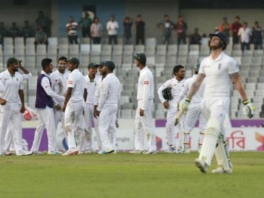 Bangladesh players celebrate the wicket of Joe Root in the second Test at Dhaka. Reuters