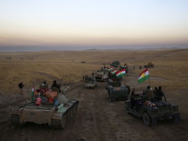 File photo of Iraqi forces waiting in the outskirts of Mosul. AP