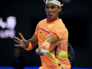 Rafael Nadal hits a return to Paolo Lorenzi during the first round of the China Open. AFP