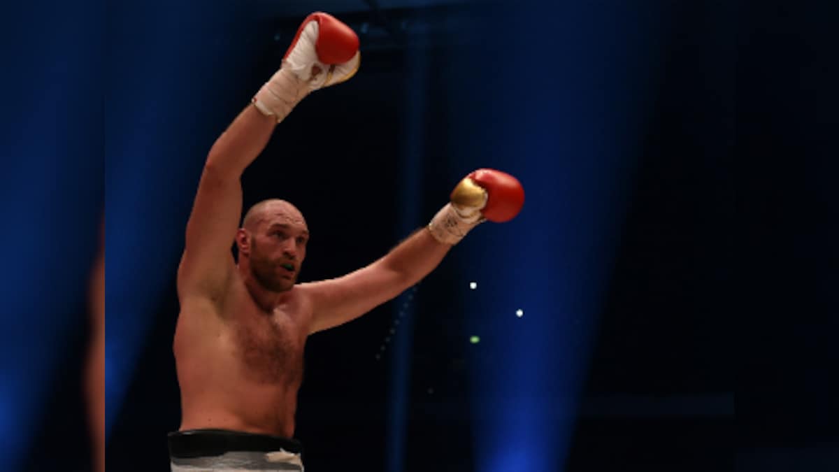 Tyson Fury overcomes bloody cut over eye to beat Otto Wallin and set up Deontay Wilder rematch