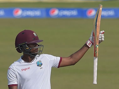West Indies' batsman Kraigg Brathwaite raises his bat after scoring 50 runs during the second day of the third and final Test against Pakistan. AFP
