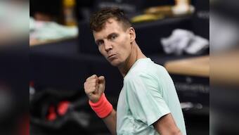Paris Masters: Tomas Berdych stays alive in hunt for World Tour Finals' spot, Milos Raonic wins