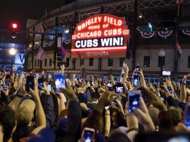Chicago fans celebrate the Chicago Cubs 8-7 victory over the Cleveland Indians. AFP