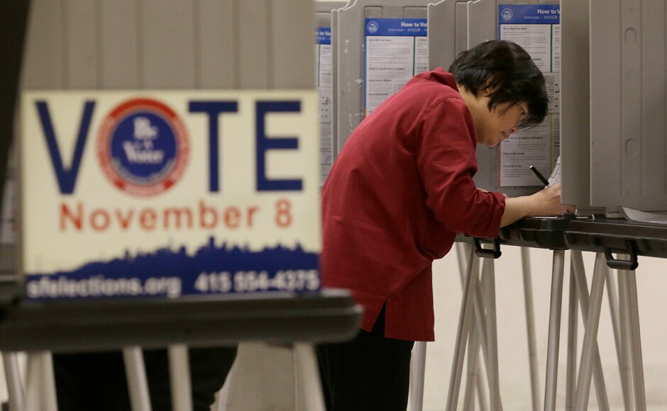 Shu Chu, originally from Taiwan, votes at City Hall in San Francisco. AP Shu Chu, originally from Taiwan, votes at City Hall in San Francisco. AP