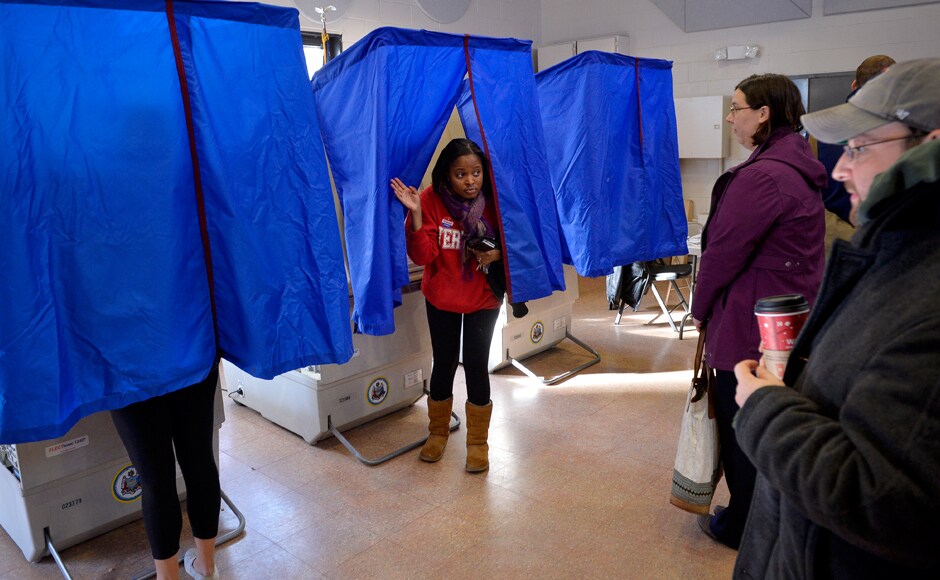 A voter leaves the polling booth in Philadelphia, Pennsylvania. Reuters A voter leaves the polling booth in Philadelphia, Pennsylvania. Reuters
