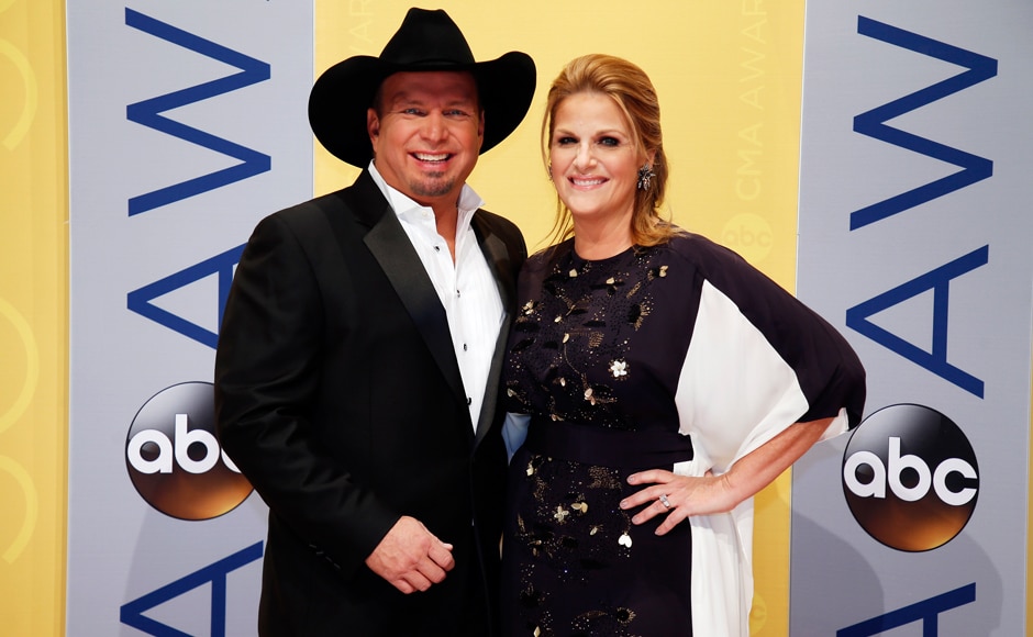 Musician Garth Brooks posing with singer Trisha Yearwood at the event night. (Photos: PTI)) Musician Garth Brooks posing with singer Trisha Yearwood at the event night. (Photos: PTI))