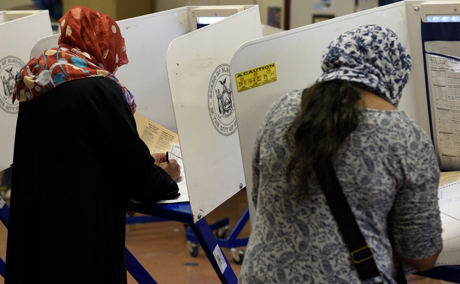 Muslim Bangladeshi Americans vote for the US presidential election in the Queens borough of New York. Reuters Muslim Bangladeshi Americans vote for the US presidential election in the Queens borough of New York. Reuters