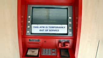 ATM chaos: Who will foot the bill for recalibration, the banks, govt or the common man?