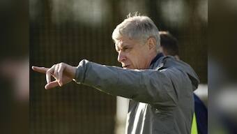 Champions League: Manager Arsene Wenger urges Arsenal to 'finish the job' against PSG